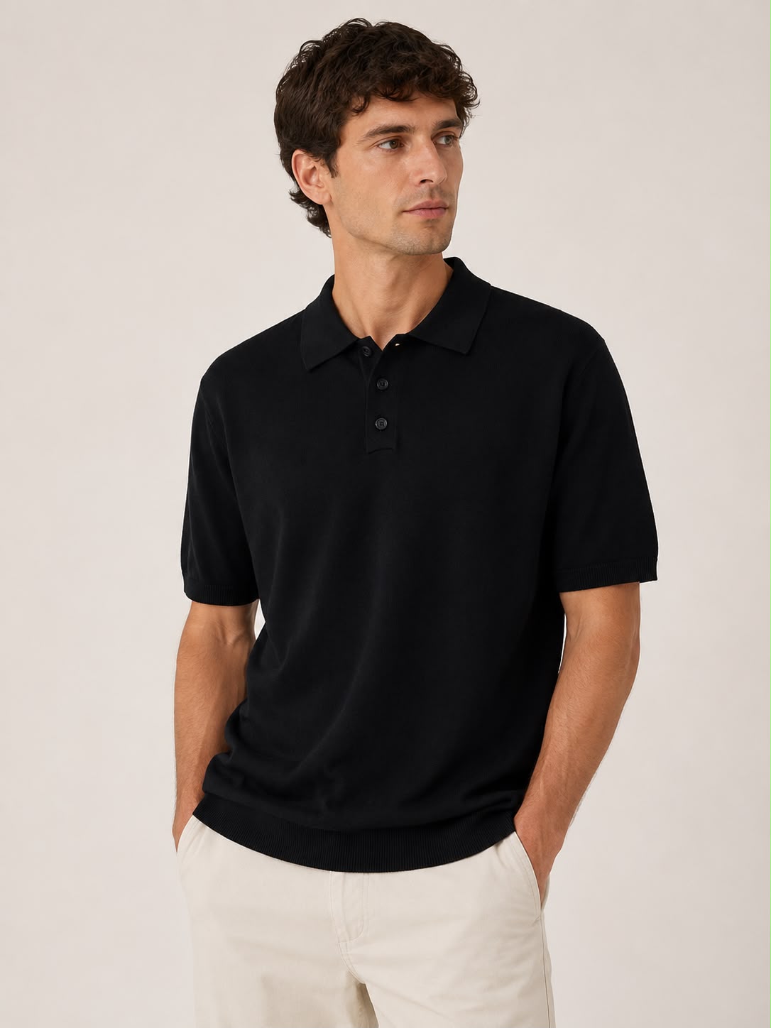 Cotton Linen Polo in Black on a studio model