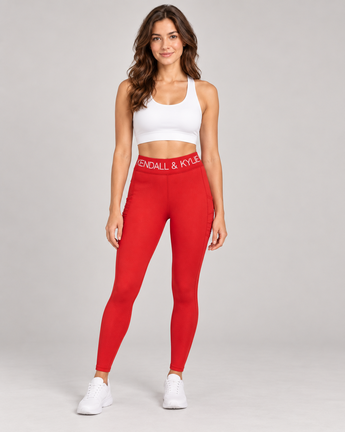 Kendall & Kylie Ribbed Gym Leggings in Red on a female studio model
