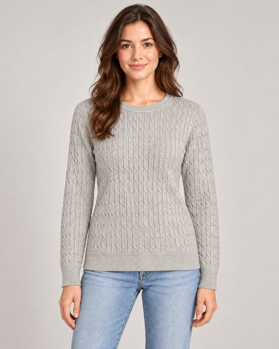 Female model wearing a grey textured crew neck jumper