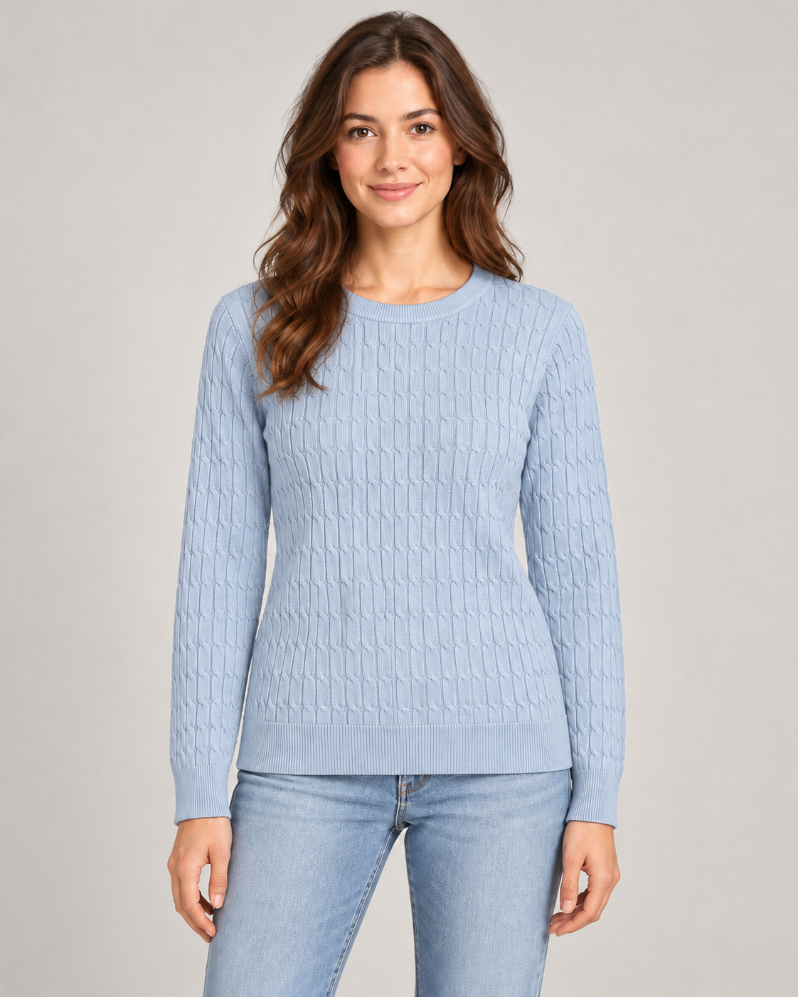 Female model wearing a light blue textured crew neck jumper