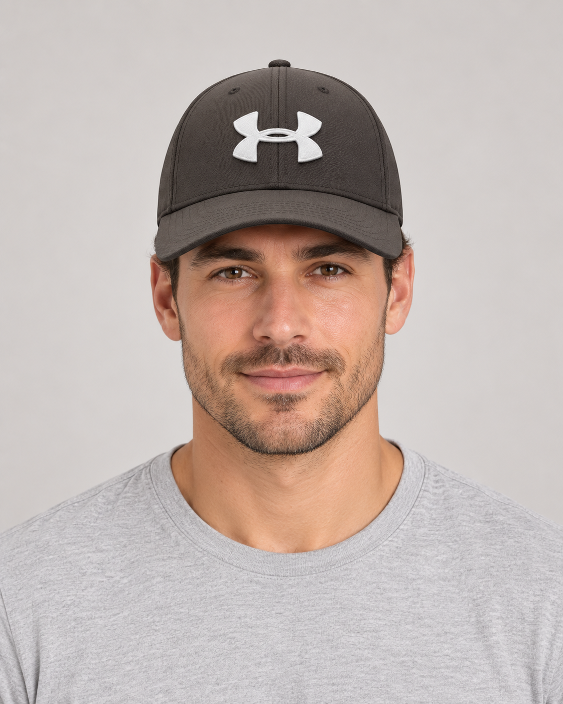 Under Armour Baseball Cap in Khaki on a studio model