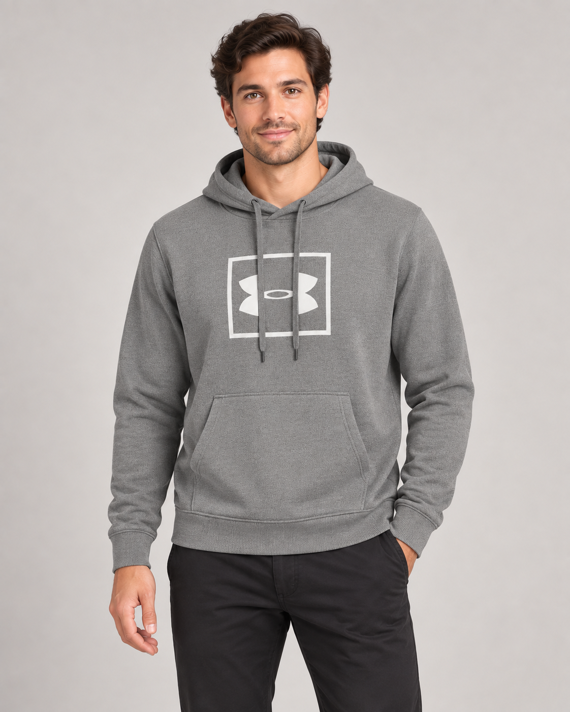 Under Armour Box Logo Hoodie in Grey on a studio model