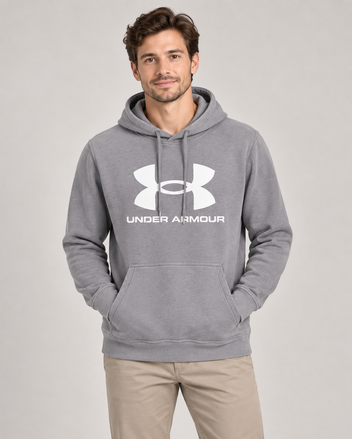 Under Armour Written Logo Hoodie in Sage on a studio model