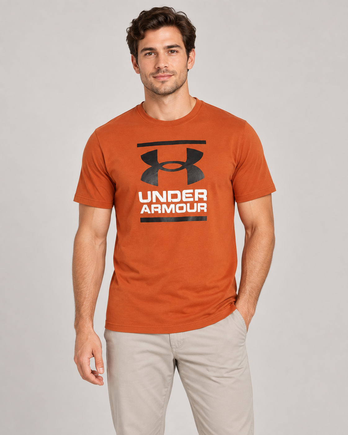 Under Armour Written Logo Top in Brick on a studio model
