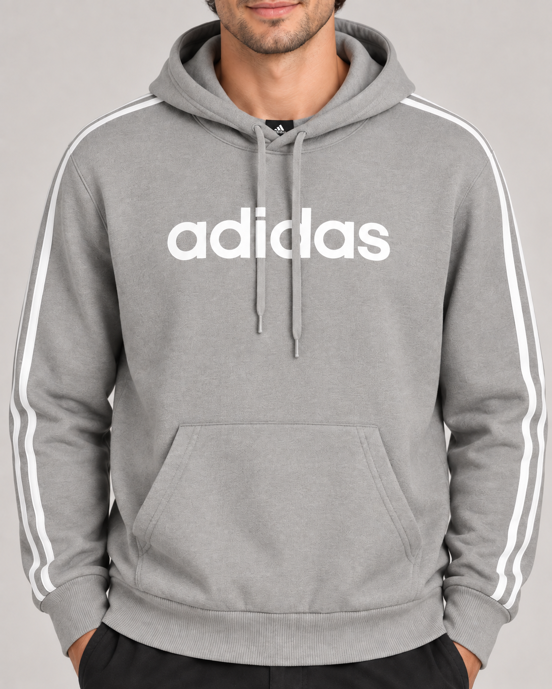 Grey Adidas hoodie chest and pocket close-up