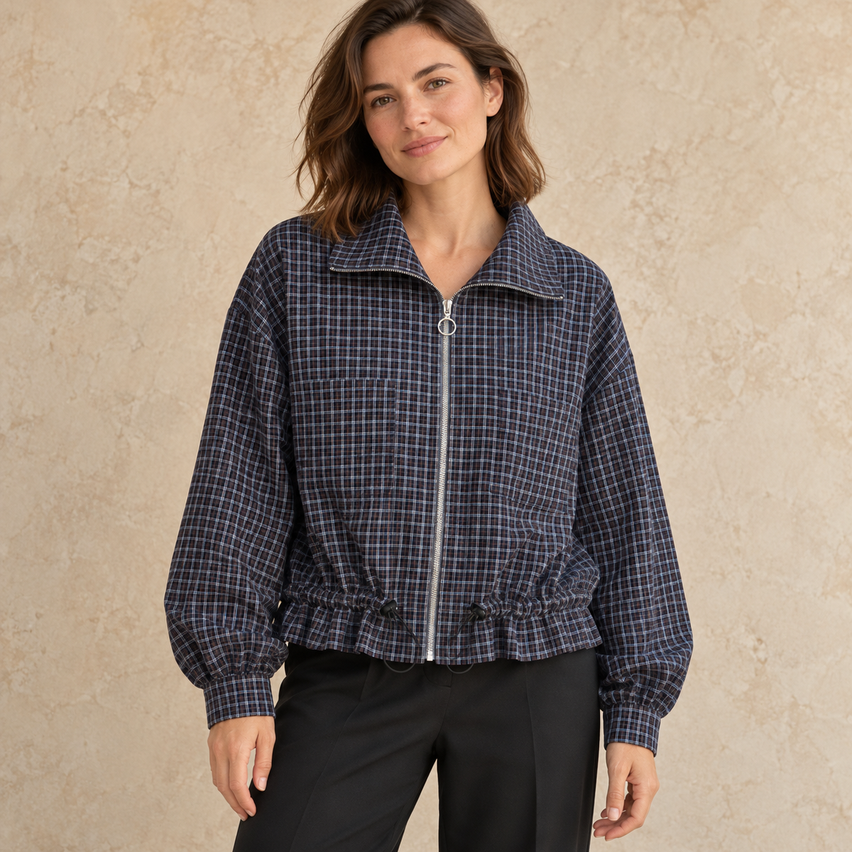Model wearing navy checked drawcord zip jacket
