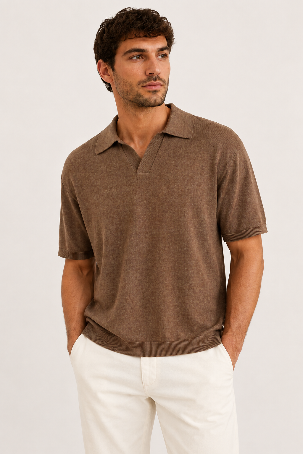 Light brown fine knit open collar polo on a male model, portrait studio photograph