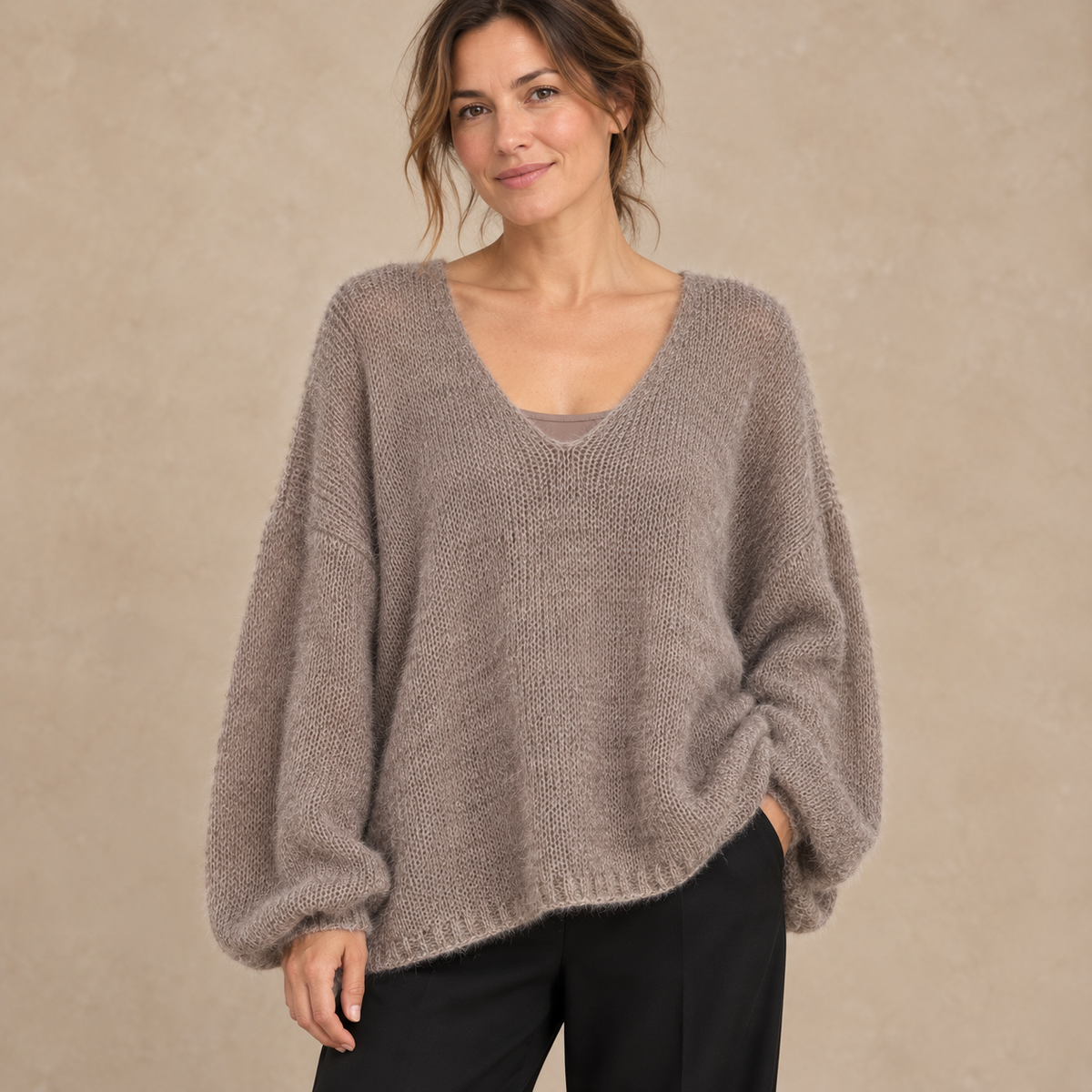 Model wearing mocha fluffy open-knit V-neck jumper