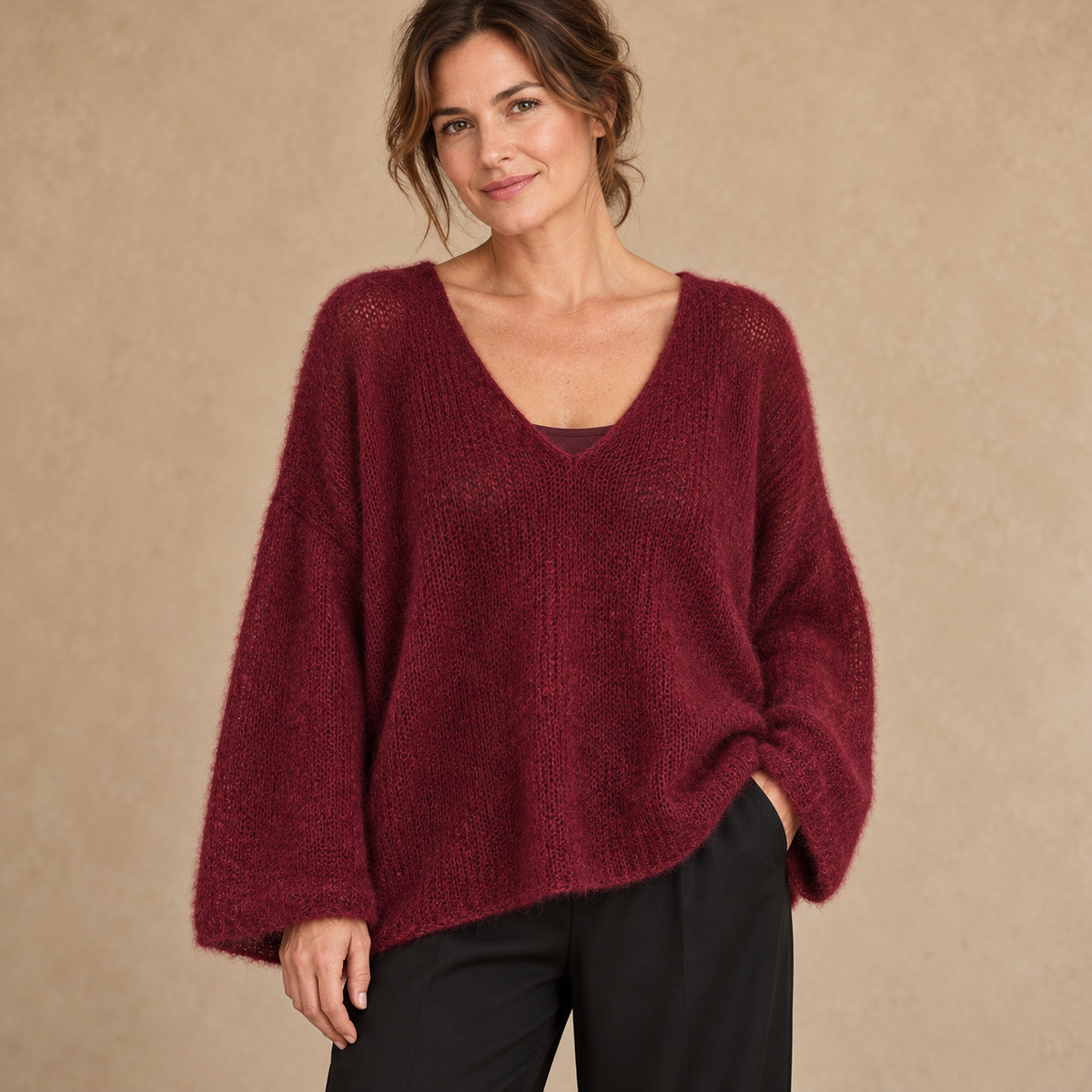 Model wearing wine fluffy open-knit V-neck jumper