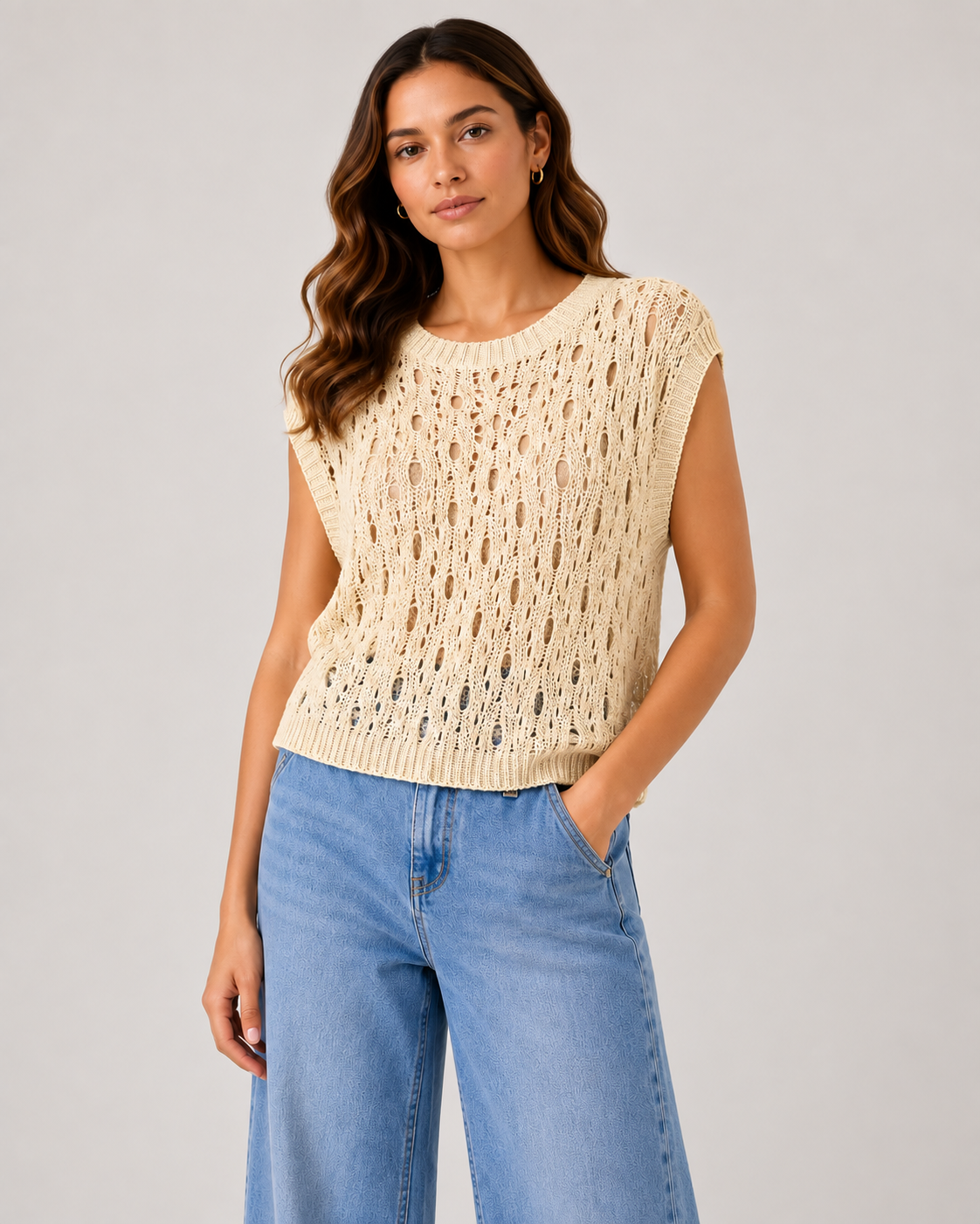 Gold Detail Mesh Top on a female model against a neutral studio background