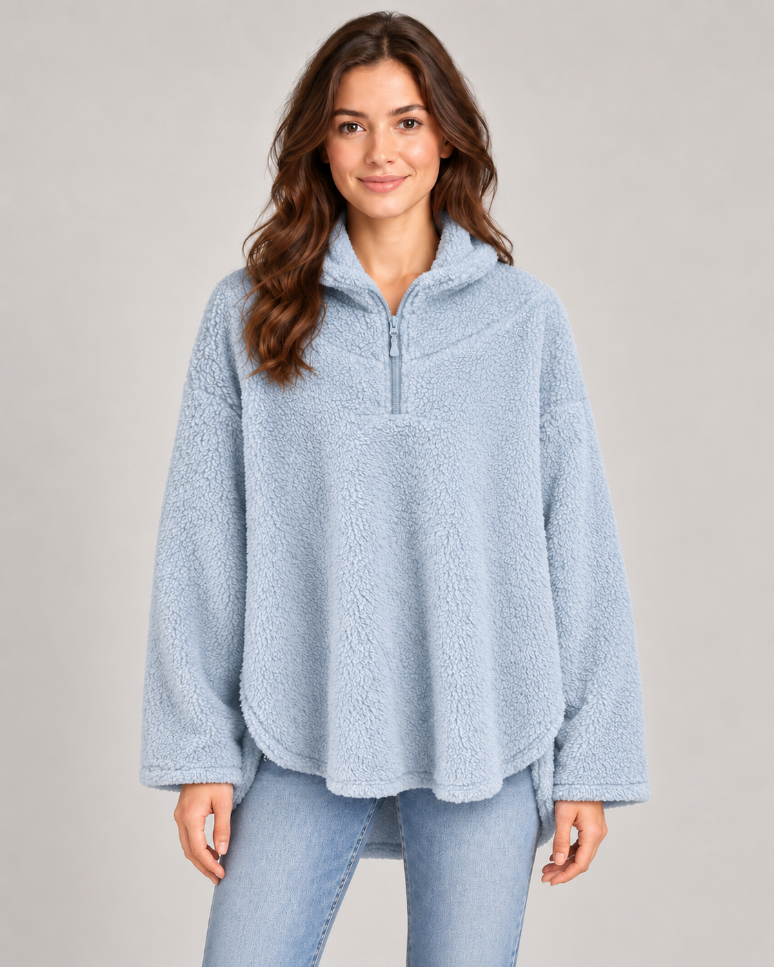 Blue oversized fluffy top on a female studio model