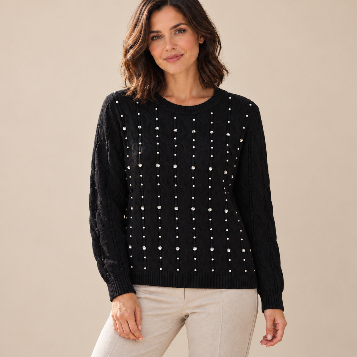 Black embellished cable knit jumper on model