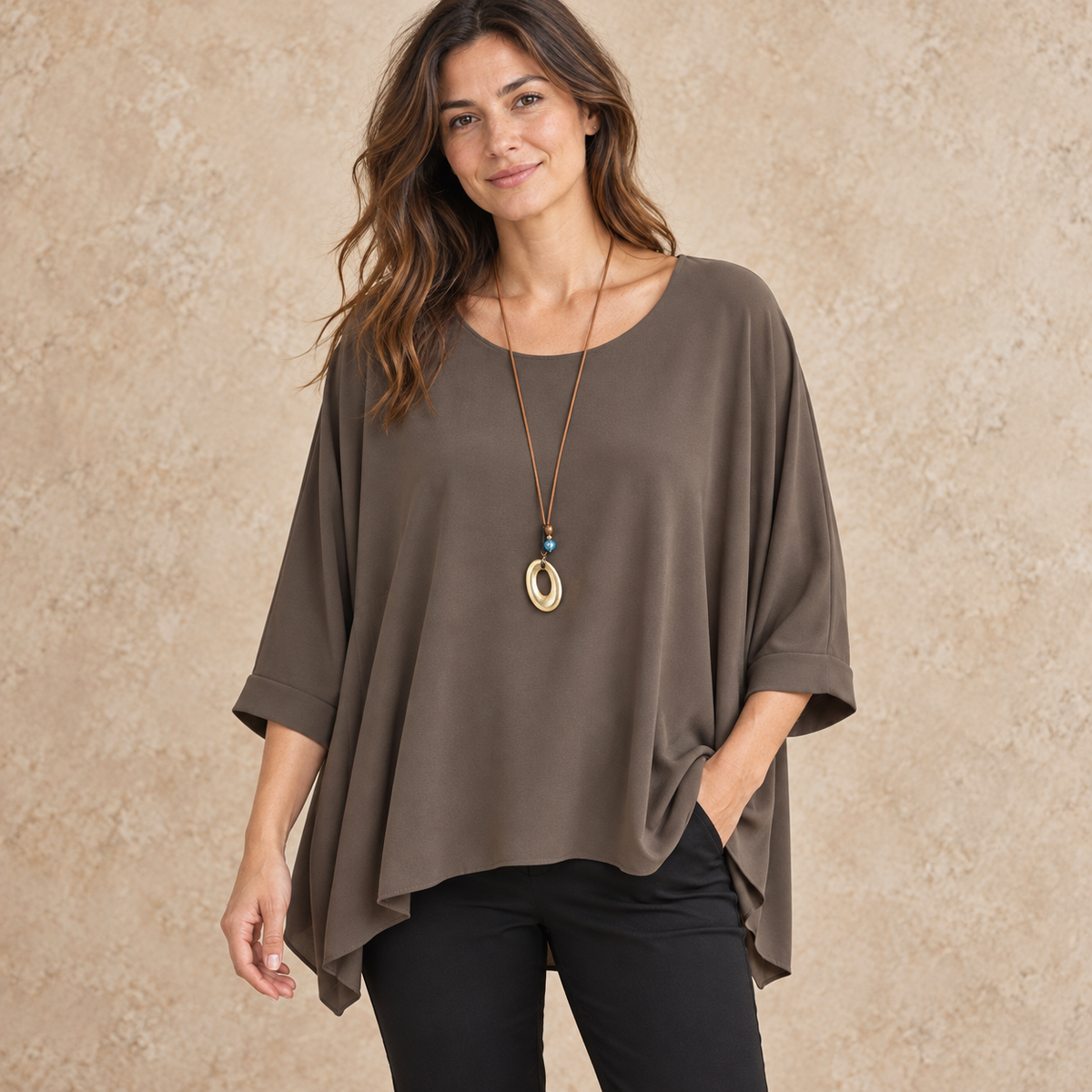 Model wearing chocolate relaxed batwing top