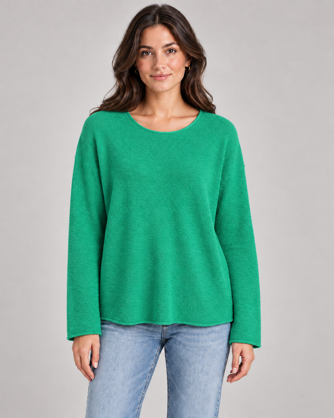Women's round neck fine knit top in Emerald Green on a female studio model