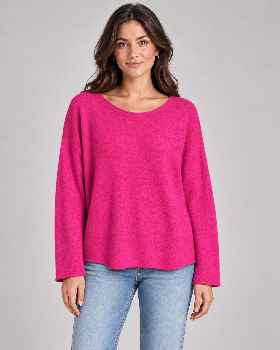 Women's round neck fine knit top in Fuchsia on a female studio model