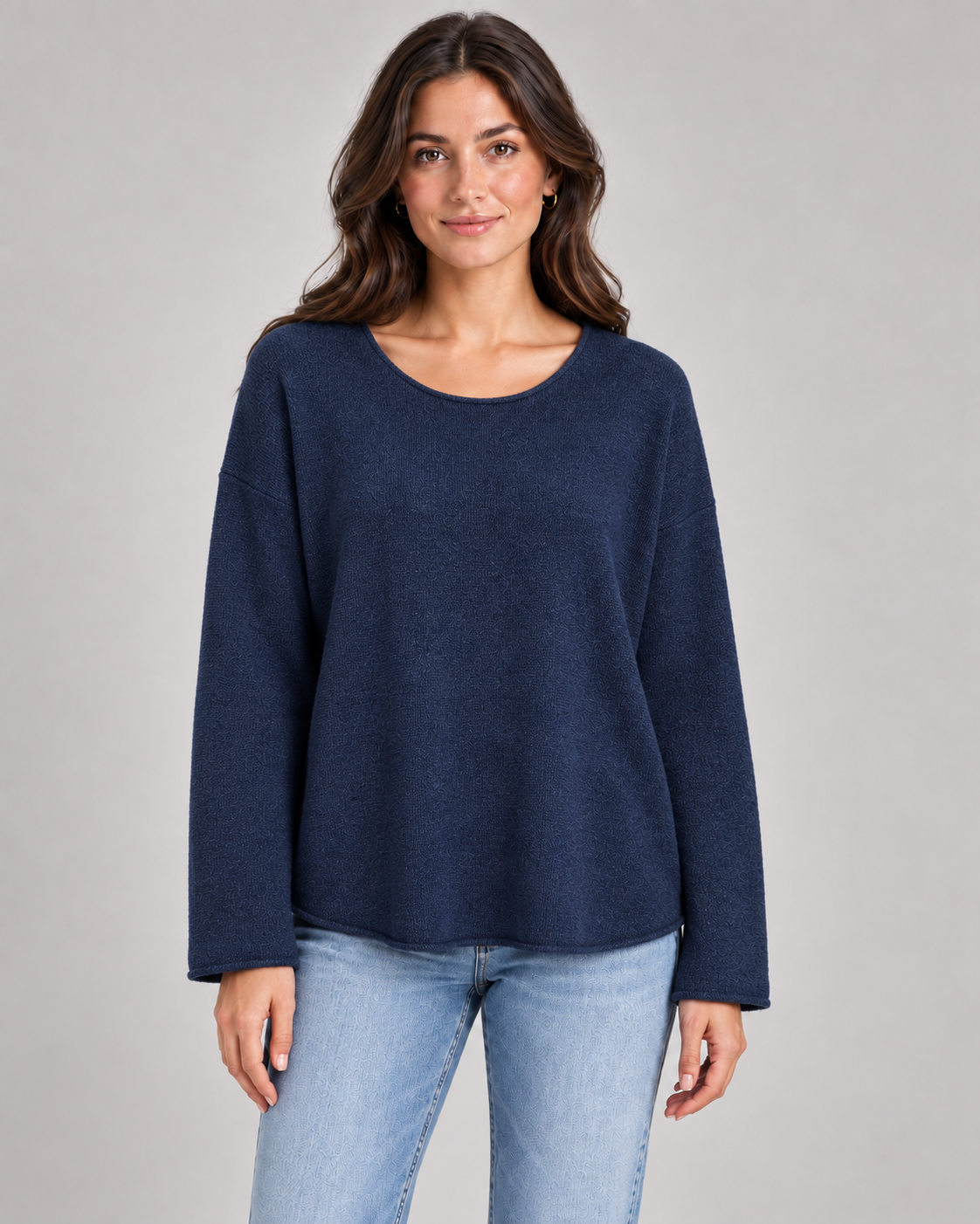 Women's round neck fine knit top in Navy on a female studio model