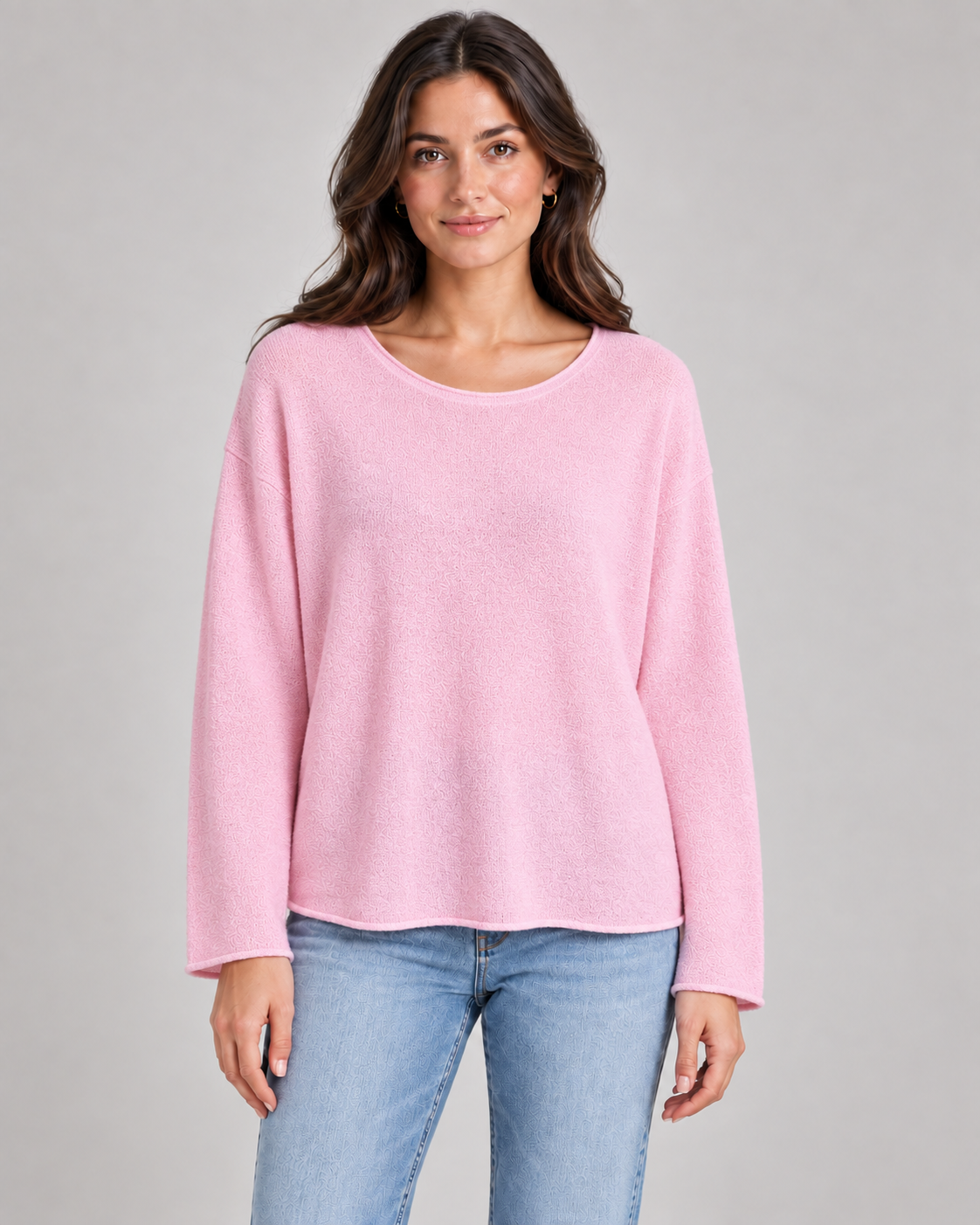 Women's round neck fine knit top in Pale Pink on a female studio model