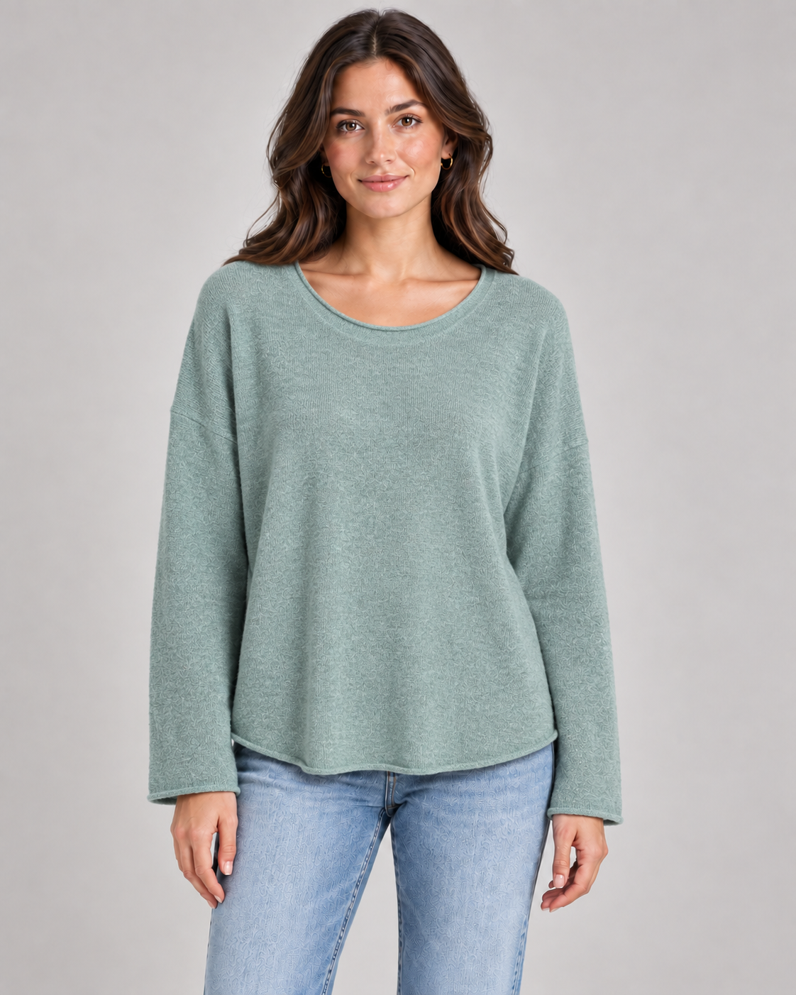 Women's round neck fine knit top in Sage on a female studio model