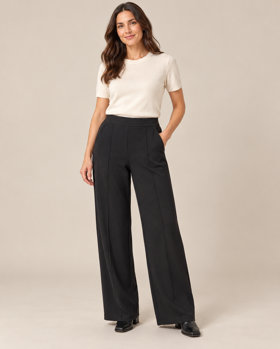 Pintuck Wide Leg Trousers – Black worn by a model
