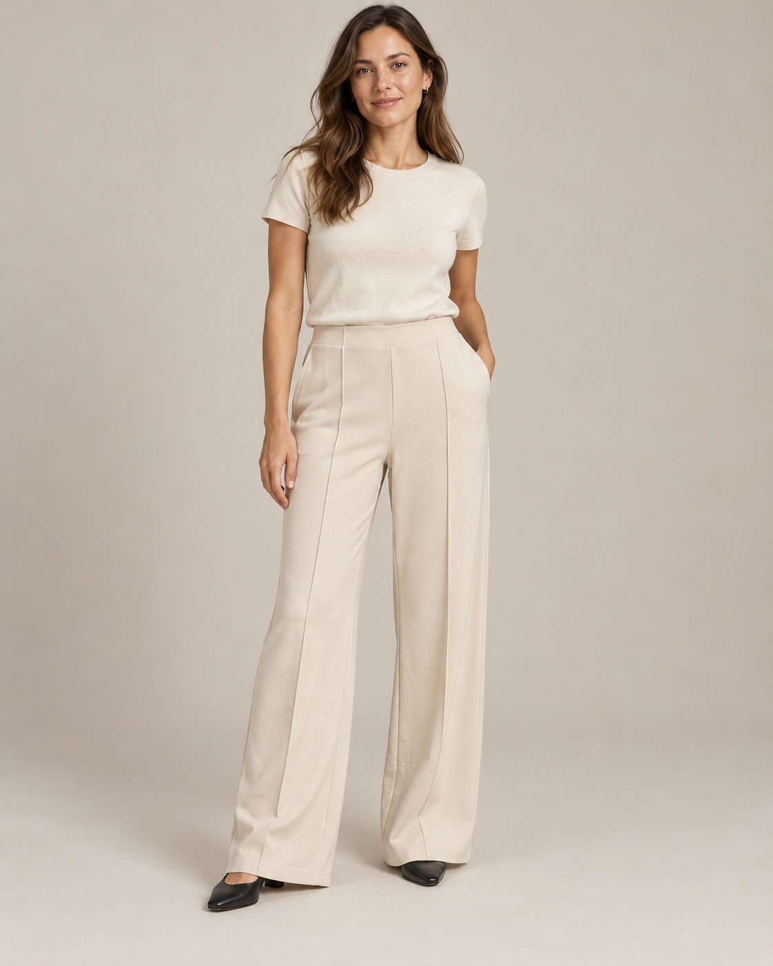 Pintuck Wide Leg Trousers – Cream worn by a model