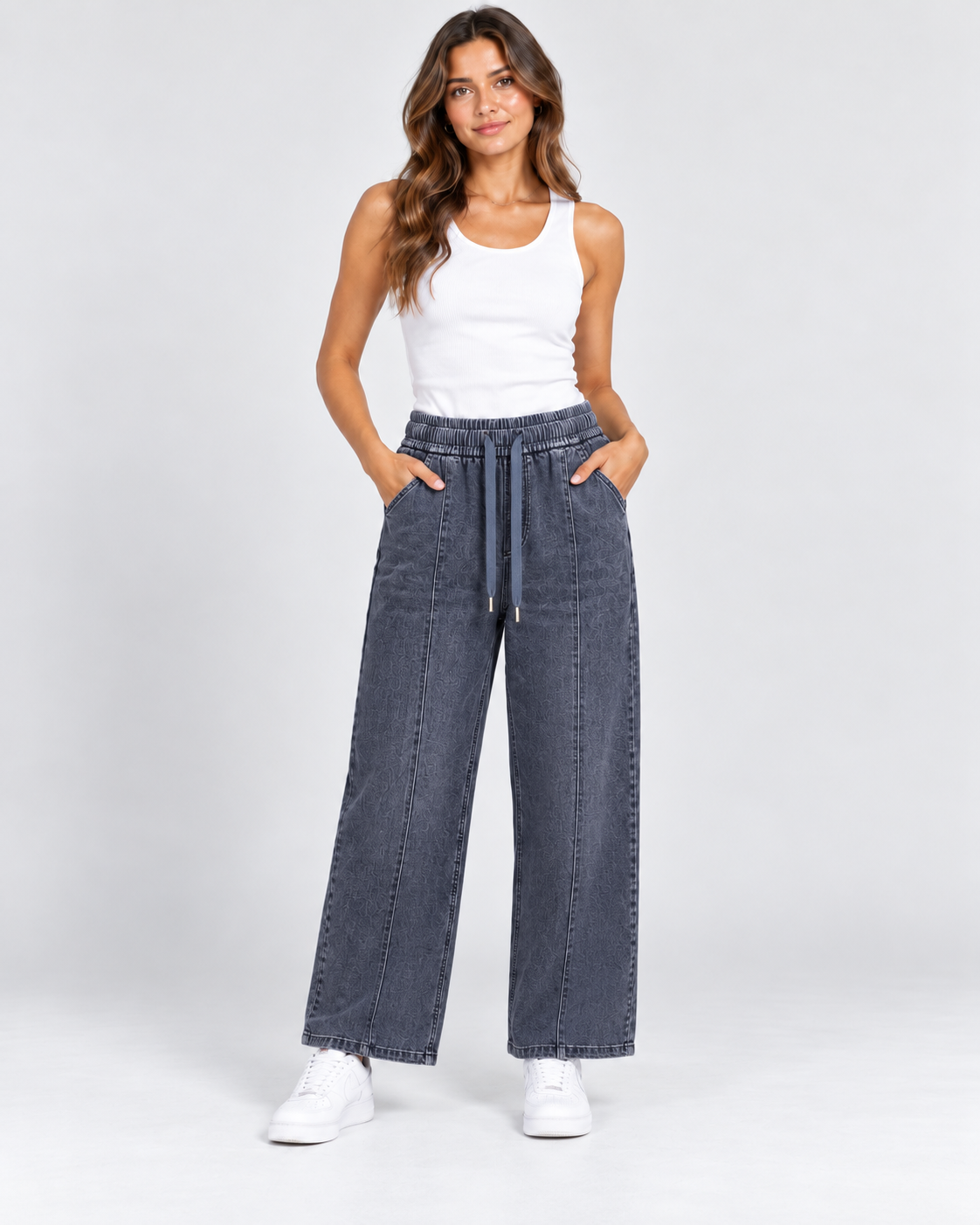 Women's short leg wide-leg drawstring denim trousers in Charcoal Grey shown on a realistic AI fashion model