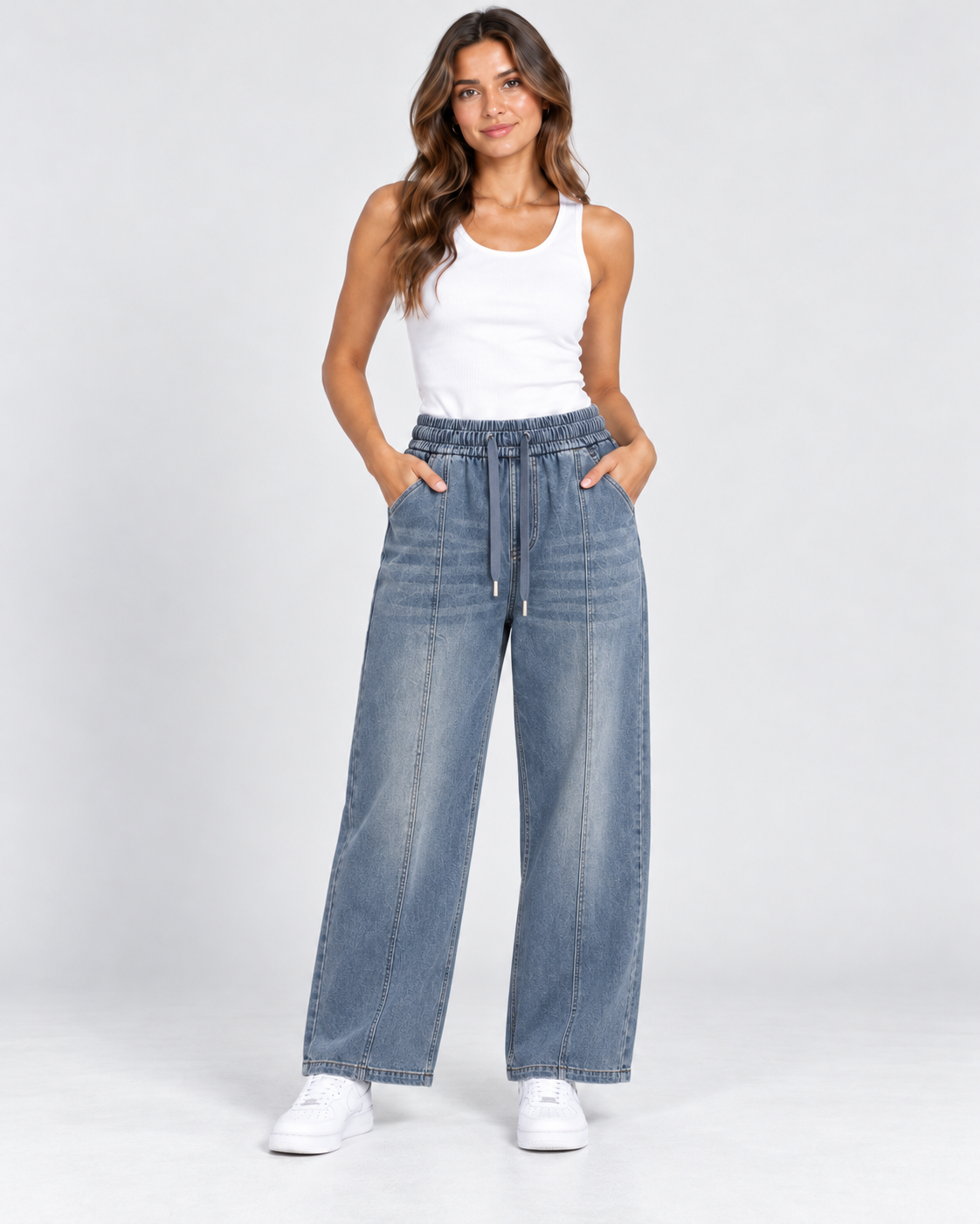 Women's short leg wide-leg drawstring denim trousers in Light Blue shown on a realistic AI fashion model