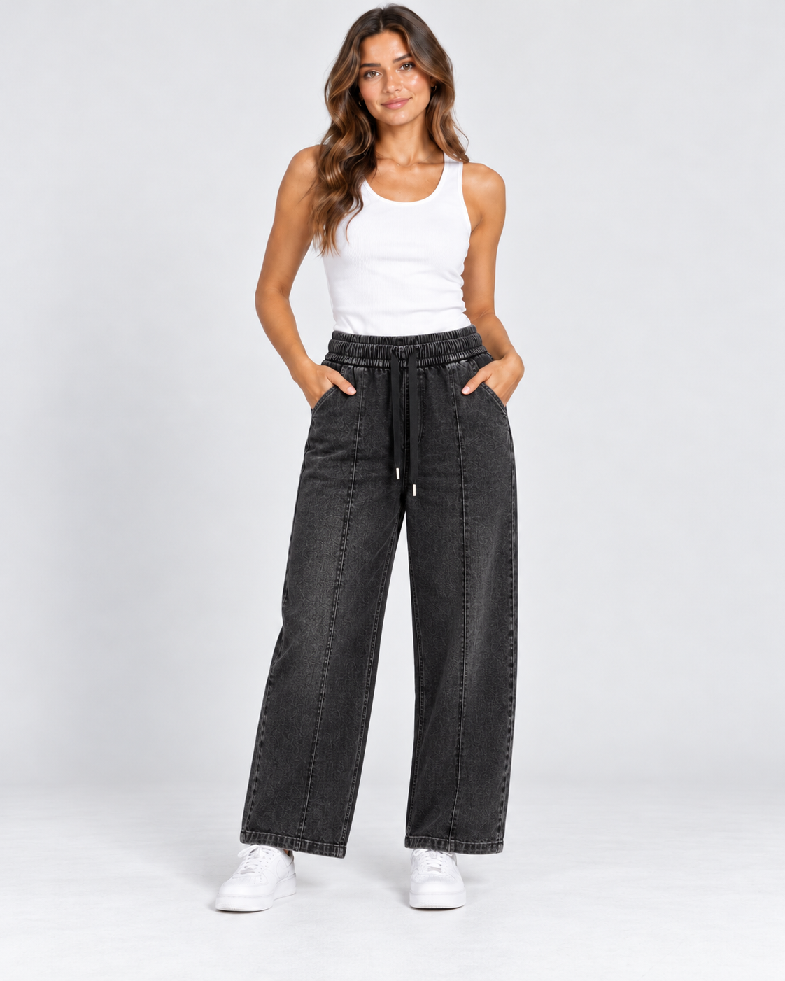 Women's short leg wide-leg drawstring denim trousers in Washed Black shown on a realistic AI fashion model