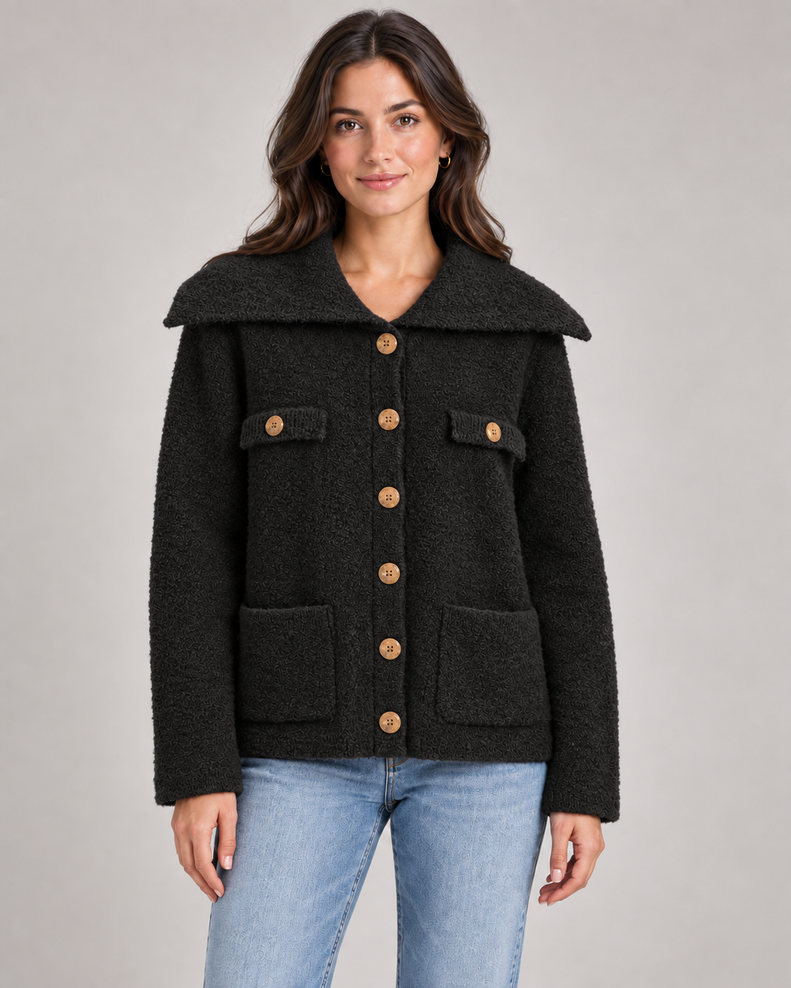 Black wide collar textured cardigan on a woman